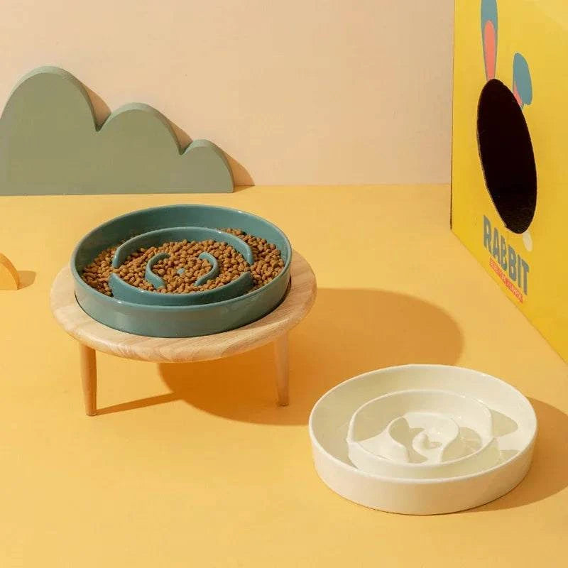 Elevated ceramic dog bowl with wooden stand for slow feeding pet cats and dogs